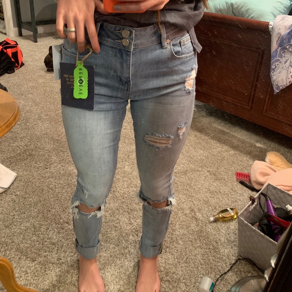 New with tags ripped jeans